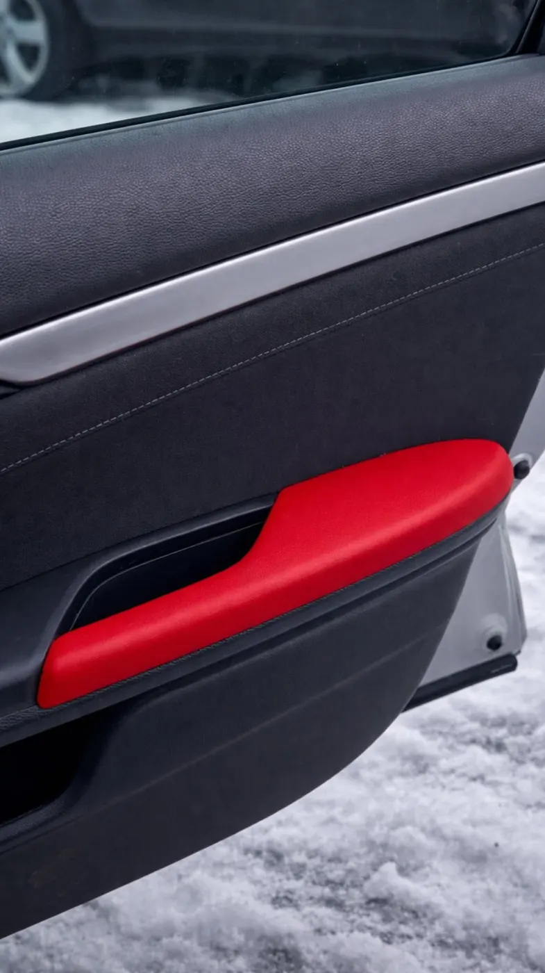 Replacement door handle trim installed in a car